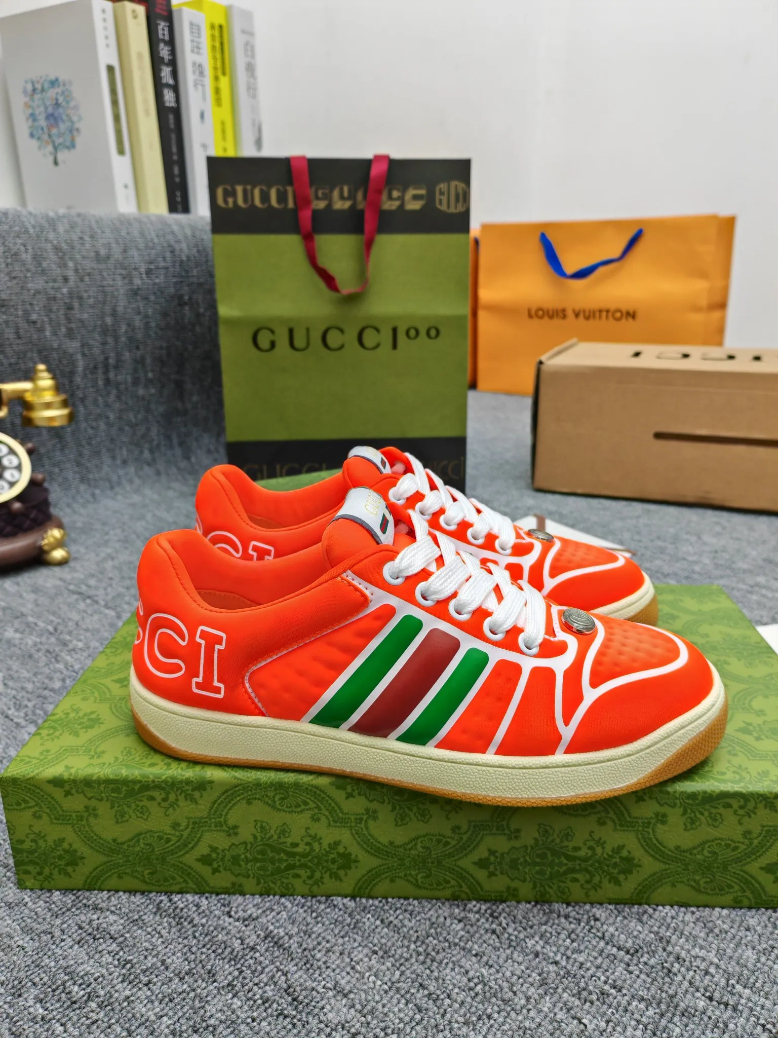 Factory price 600💰Screener series embellished web sneakers. This item is from the Gucci Lido series. Its design is inspired by the summer style and beach clubs of the Italian coast. The Screener series of sneakers draws inspiration from classic sneakers from the 1970s and takes its name from a special defensive move in sports. This shoe from the 2024 Pre-Fall collection is crafted from yellow rubber, a technical and malleable opaque material, with striped webbing on the sides and an embossed Gucci printed logo on the heel. Yellow rubber, opaque and technological in appearance. Red and green webbing decorated with metal Double G oval enamel details. Gucci printed embossed logo. Women 35-40, men 38-45, (men 38 and 45 need to be customized)